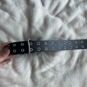 Silver and black belt